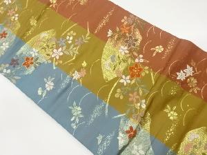 地紙に草花・芝模様織出し名古屋帯